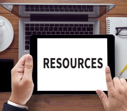 Resources,,On,The,Tablet,Pc,Screen,Held,By,Businessman,Hands